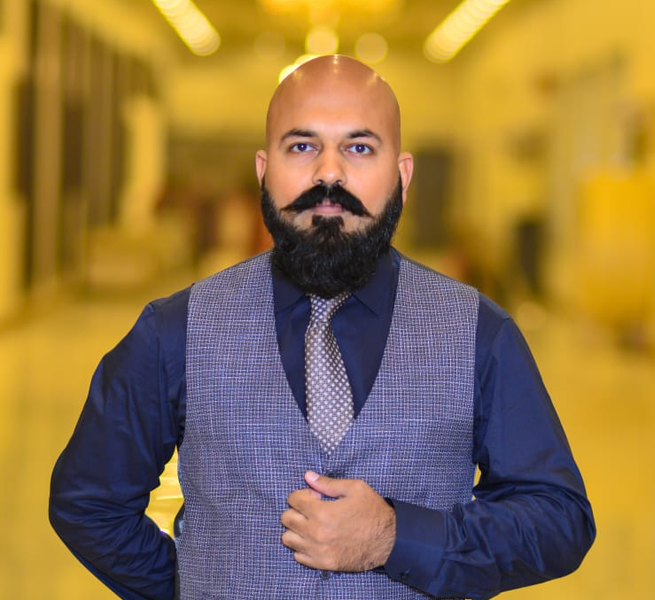 M. Afaq Fida — Director